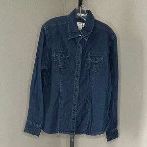 Long sleeve denim shirt with pockets and buttons.